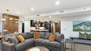 The living area offers plenty of seating for your group to enjoy time together.