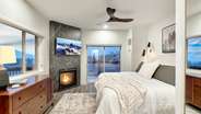 The fireplace allows you to cozy up while you watch TV or enjoy the views.
