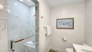 The shower features a steam option and a bench for your convenience.