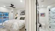 The en-suite bathroom connects to the bedroom...
