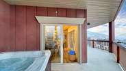 The hot tub is a huge hit and boasts amazing views year-round.
