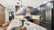 The kitchen has everything you'll need to cook during your stay and offers bar seating for 3.