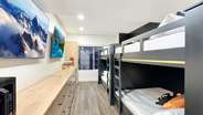 ...and two custom queen over queen bunks.