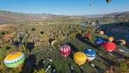 Schedule a hot air balloon ride during your trip to Park City!