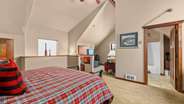 loft area bedroom with king bed