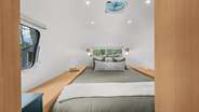 Queen size bed in the sleeping area