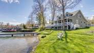 Yard and house with lakefront