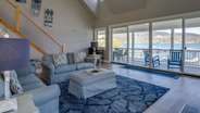 Living room with glass doors to the lake