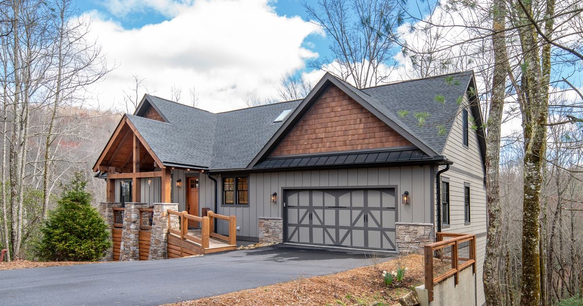 4 bedroom custom home with game room & screened in porch. White