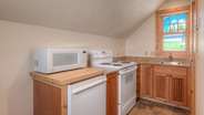 Kitchenette in upstairs king suite apartment
