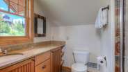 Bathroom with standing shower in upstairs king suite apartment