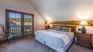 Upstairs king suite with attached bathroom and cigar patio