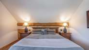 Upstairs king suite with attached bathroom and cigar patio