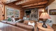 Wood burning fireplace in living room on main level