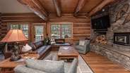 Wood burning fireplace in living room on main level