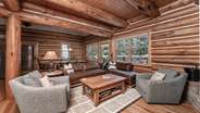 Wood burning fireplace in living room on main level