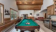 Lower level rec room with pool table and wet bar!