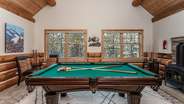 Lower level rec room with pool table and wet bar!