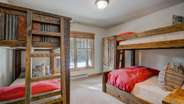 Lower level bunk room with twin/twin and twin/queen bunk beds