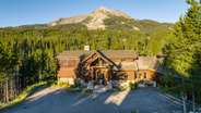 Front of Moose Creek Lodge with stunning Lone Peak backdrop