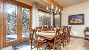 Formal dining area with additional barstool seating for up to 6 guests