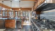 Spacious chef's kitchen with modern stainless steel appliances