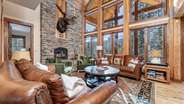 Living area on main level with wood burning fireplace