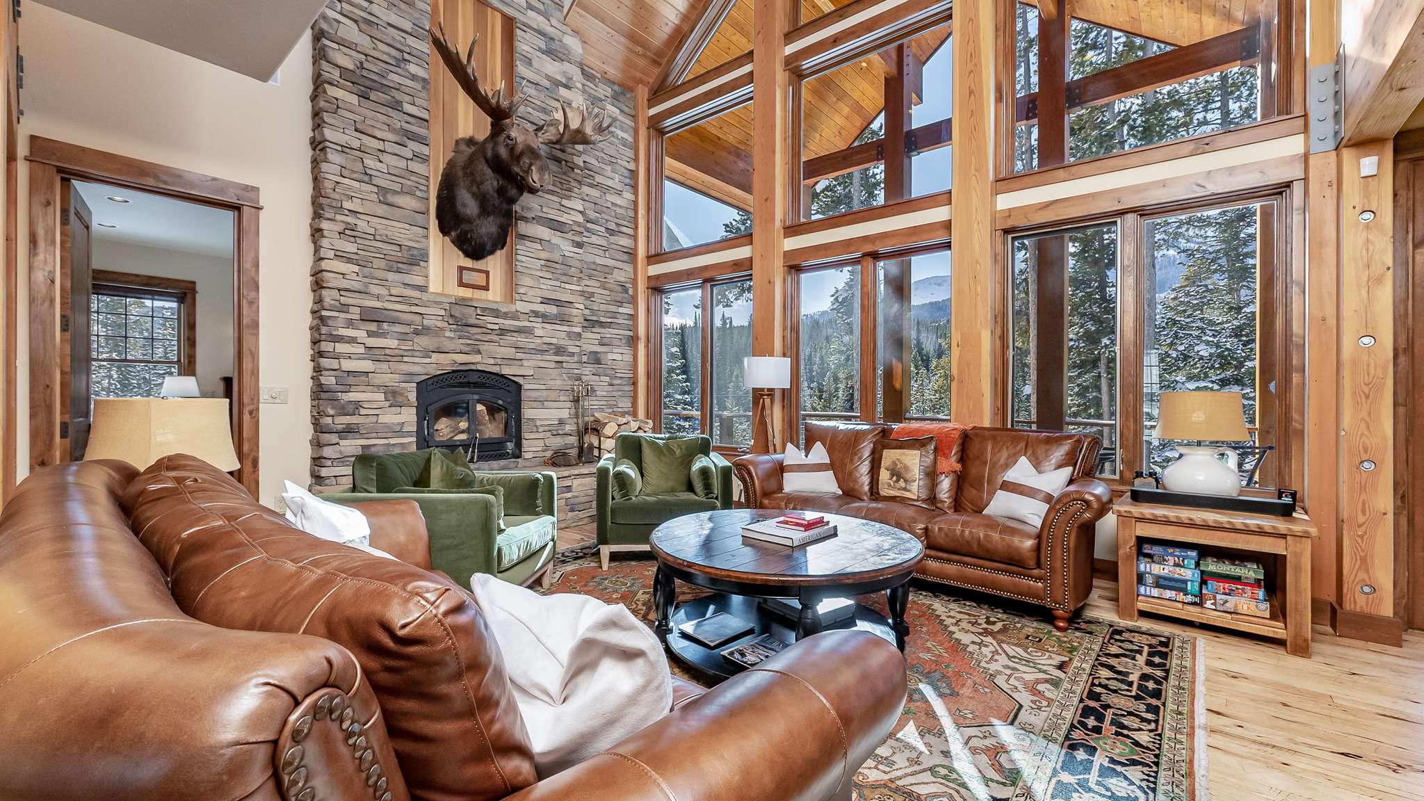 Living area on main level with wood burning fireplace