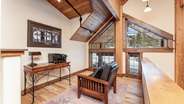 Upstairs loft area with desk