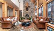 Living area on main level with wood burning fireplace