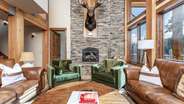 Living area on main level with wood burning fireplace