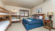 Downstairs queen room with two sets of twin/twin bunks
