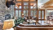 Main level entertainment space with incredible views and natural light