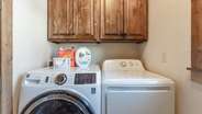 Laundry room on main level off kitchen - detergent pods and dryer sheets provided!