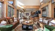 Main level entertainment space with incredible views and natural light