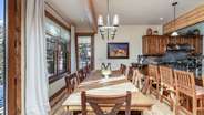 Formal dining area with additional barstool seating for up to 6 guests